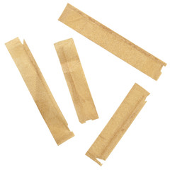 Old yellowed strips of adhesive tape