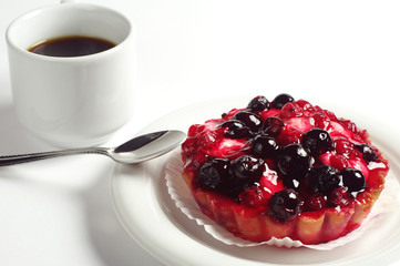 Cake with berries and coffee