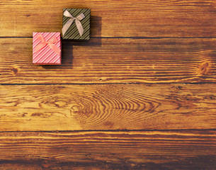 Two Gift Boxes on Wooden Background