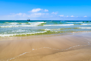 Waves on Baltic Sea beach near Leba, Poland