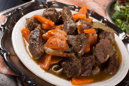 Delicious bourguignon beef stew on white plate