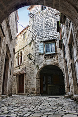 Fototapeta na wymiar narrow stone street