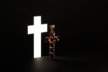 Obraz premium Golden Cross with gemstone jewel on black background
