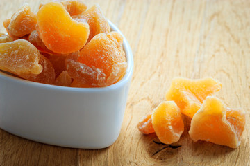 Closeup candied dried ginger in white bowl