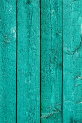 Green painted wooden fence