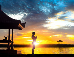 Yoga Meditation at Beach in Full Standing Lotus Position