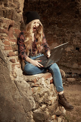 Fototapeta premium Girl beating computer