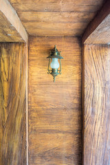 The vintage lantern decorated on the wall for interior design. I