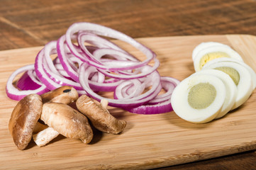 Red onions mushrooms and slice eggs