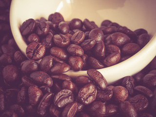 beans on white cup with filter effect retro vintage style