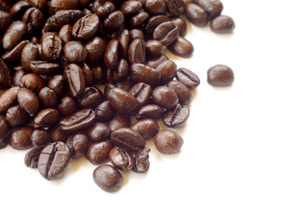 Brown coffee beans isolated on white background