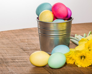 Silver container of dyed Easter eggs