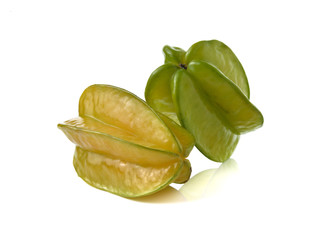 ripe star fruit on white background