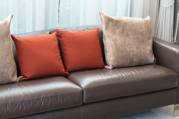 Fototapeta na wymiar modern living room design with sofa and red pillows