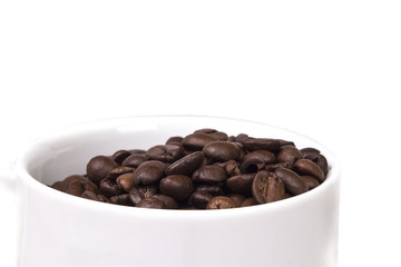grain black coffee poured into a white cup