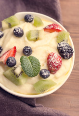 Bowl of semolina dessert with berries