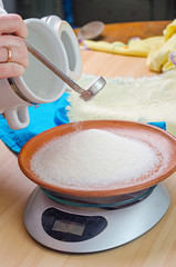 white sugar in the scale