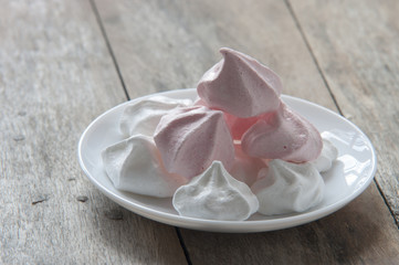 Meringue cookies in plate