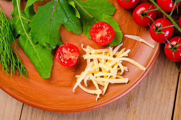 tomato cherry on wooden board