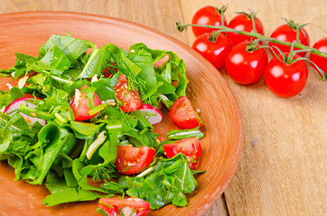 tomato cherry on wooden board