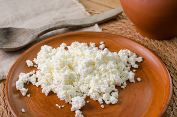 curds on the brown plate