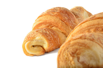 Two croissant on a white background