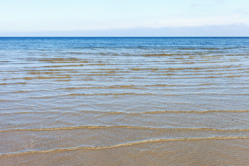 Fototapeta na wymiar Calm water in gulf of Riga, Baltic sea.