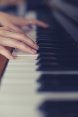 Fototapeta na wymiar Lady playing piano