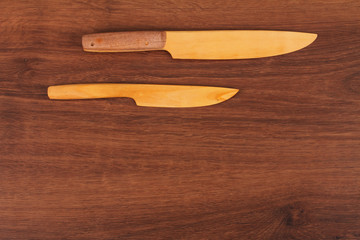 The Wooden Table Knife on the wood
