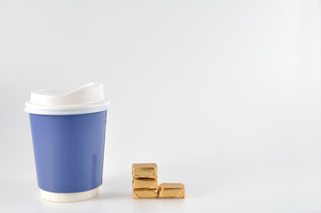 Small candies with take home paper coffee cup