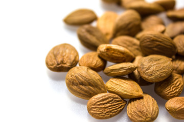 Apricot kernel / nuts isolated on white background.