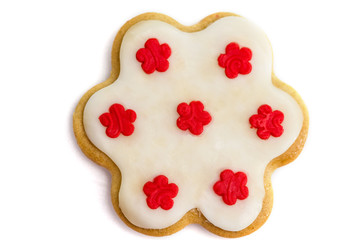 Gingerbread cookies with royal icing in the shape of a flower