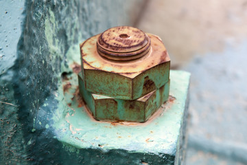 Macro photo of old rusted nuts and bolt