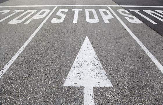 Stop sign on asphalt