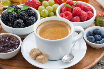 Breakfast with coffee and fresh berries