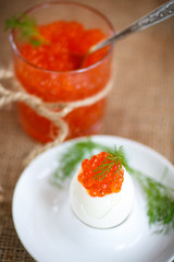boiled egg with red caviar