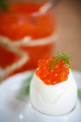 boiled egg with red caviar
