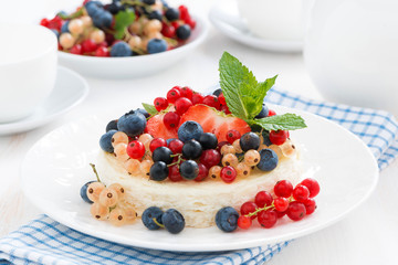 mini cheesecake with fresh berries on a plate