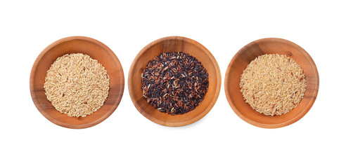 Coarse rice, brown rice and red rice on  background