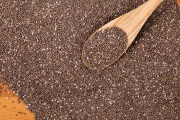 Chia seeds with wooden spoon