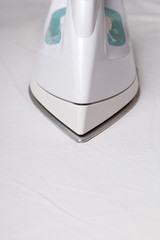 close up of iron ironing linen