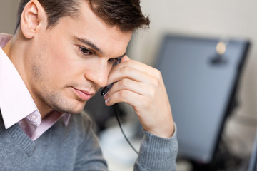 Serious Customer Service Representative In Office
