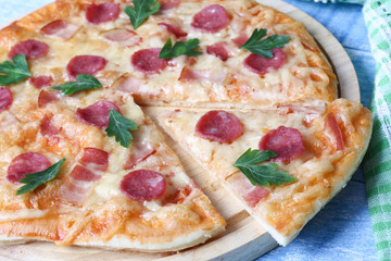 pizza with sausage and bacon