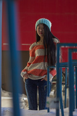 portrait of stylish Asian girl on the street