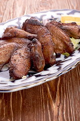 Meat on a grill with vegetables