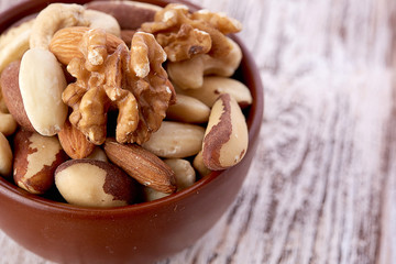 Mix nuts  on wooden  background