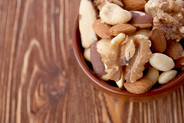 Mix nuts  on wooden  background