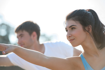 Young couple doing yoga