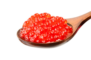 Red salted caviar with wooden spoon on white background