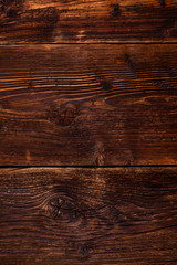 Naklejka premium Aged wooden background.
